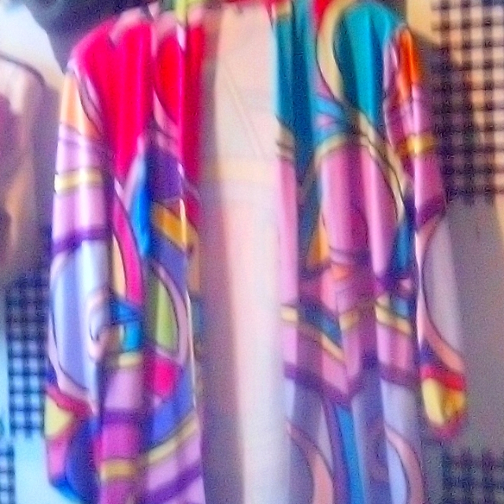 A mid length cardigan style jacket